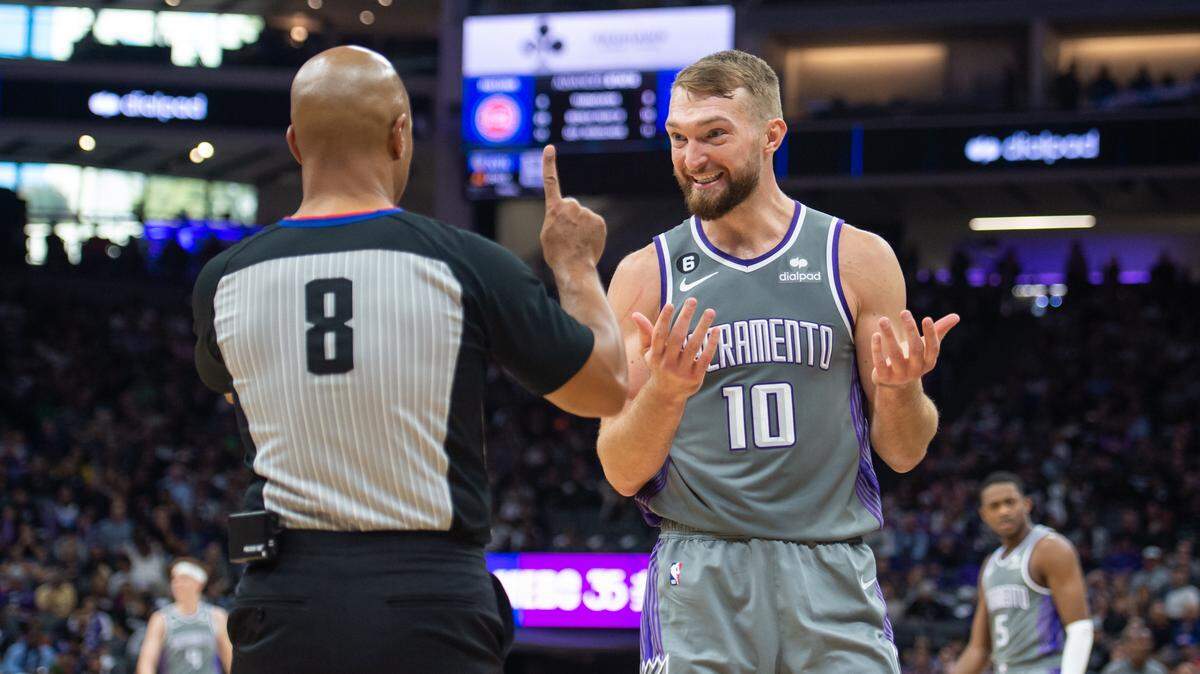 Sacramento Kings forward Domantas Sabonis (10) argues a call with referee Marc Davis (8) during the second quarter against the Detroit Pistons in the NBA basketball game Sunday, Nov. 20, 2022, at Golden 1 Center in Sacramento.