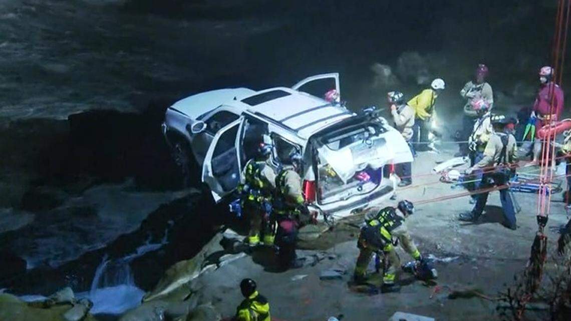 A man was rescued from an SUV that plunged over a cliff onto rocks just above the surf in La Jolla, California officials say.