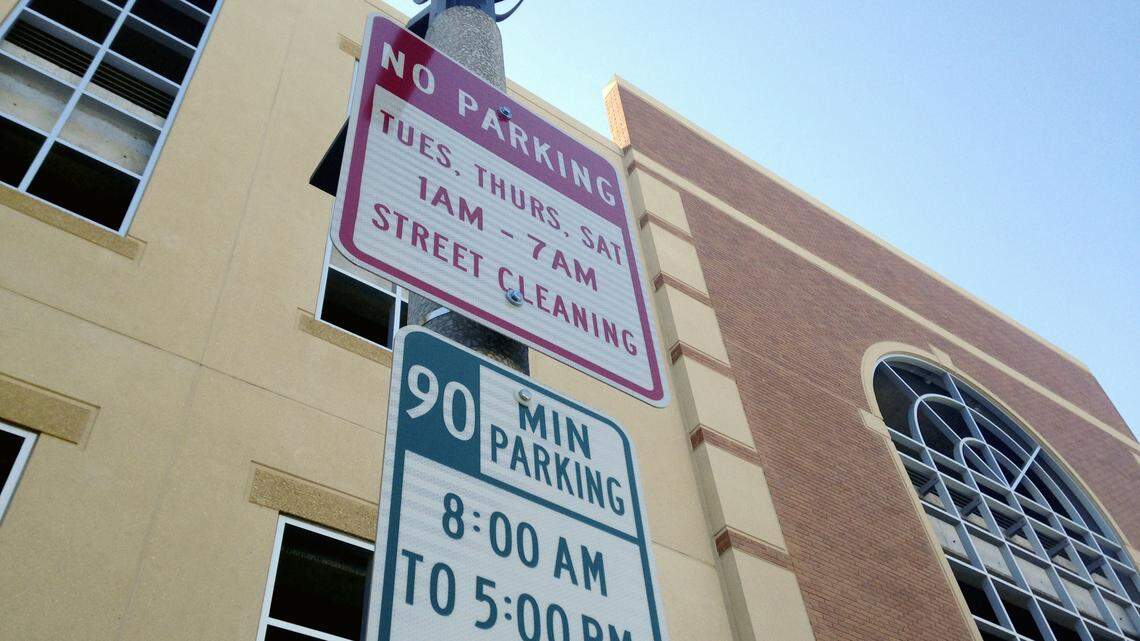 No Parking signs are displayed in downtown Bismarck, N.D., Tuesday, March 7, 2017. North Dakota is the only state that bans parking meters, but now Gov. Doug Burgum is quietly trying to end the nearly 70-year ban in hopes of revitalizing downtowns. By reintroducing meters, Burgum and his allies in the Legislature hope to encourage more parking turnover, leading to more retail sales for businesses and more tax revenue for communities and the state. (AP Photo/James MacPherson)
