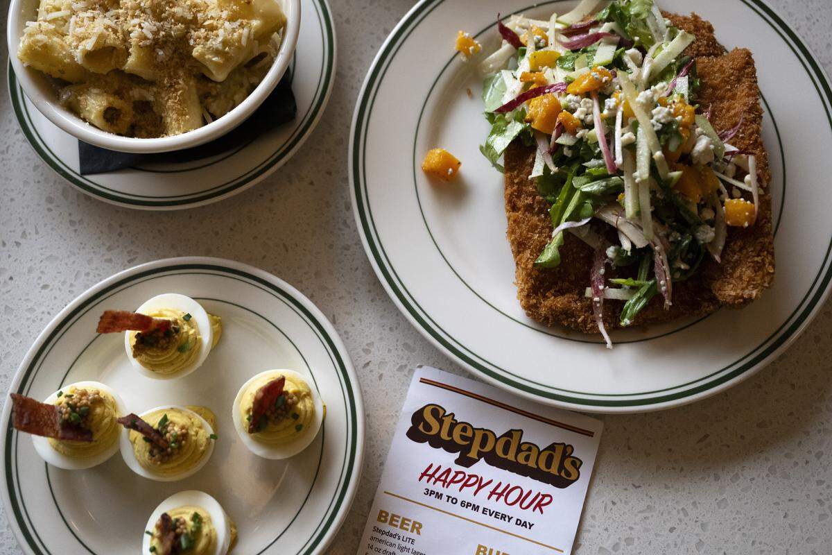 The pork schnitzel, green chili mac and deviled eggs at Stepdad’s in Land Park on Wednesday, Nov. 26, 2025.