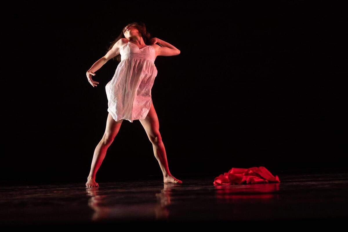 Michelle Katcher performs “Malayah,” choreographed by Victor Maguad to portray his sister’s experience giving birth to a child that lived for only 16 hours due to a birth defect, during Sacramento Ballet’s Beer & Ballet showcase at SacBallet Studios on Wednesday, May 11, 2022, in midtown Sacramento. The series, which runs May 6-21, features 12 new works by company dancer-artists on the James Hargrove Outdoor Performance Stage, while event partner Bike Dog Brewery provides the local craft beer next to an array of food trucks.