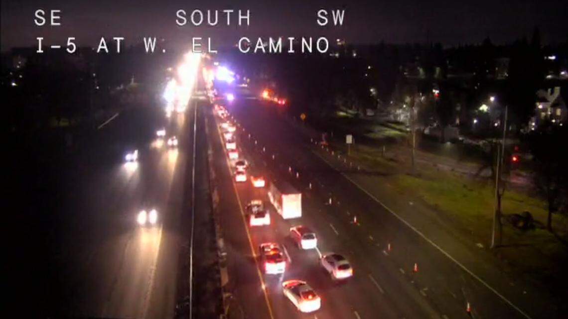 Traffic is delayed early Monday, Feb. 8, 2021, after a deadly pedestrian crash on southbound Interstate 5 near West El Camino Avenue in Sacramento.
