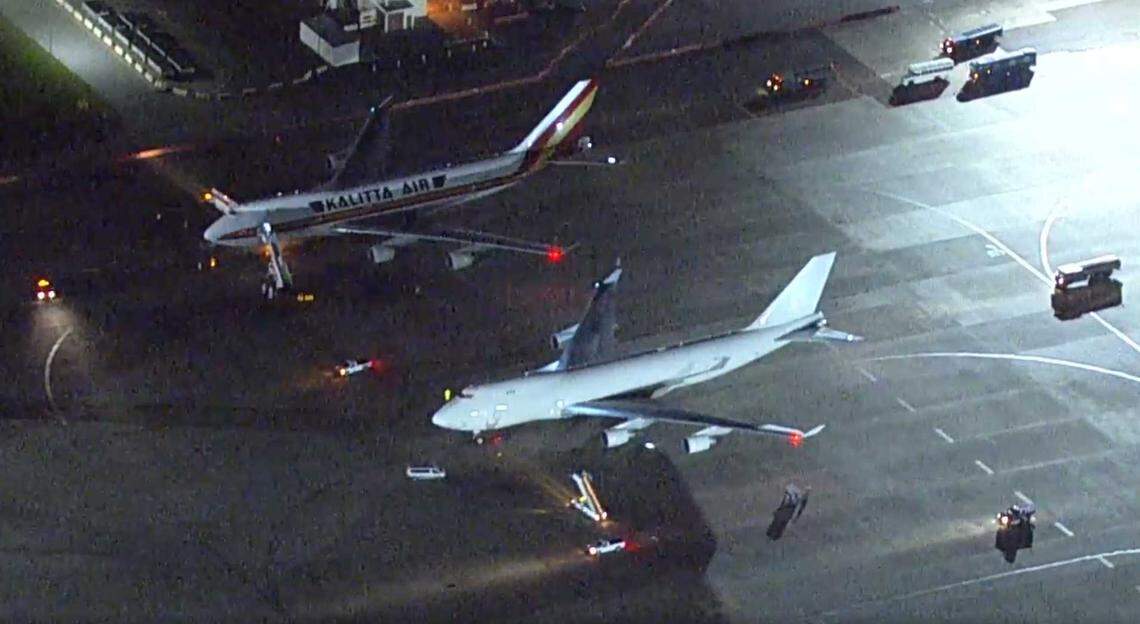 In an image of aerial footage from KGO-TV, the ABC affiliate in San Francisco, Kalitta Air Flight 373 and 375 are parked at Travis Air Force Base near Fairfield, California, on Wednesday, Feb. 5, 2020. About 350 Americans aboard two jumbo jets flew from Wuhan, China, to the Northern California air base as part of the evacuation of citizens from the coronavirus hot zone.