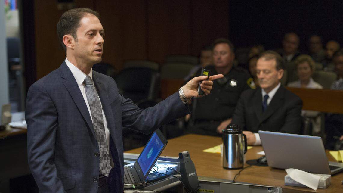 Sacramento County prosecutor Noah Phillips makes his closing statement as Orville Fleming sits in court on Monday, May 22, 2015 in Sacramento Superior Court.