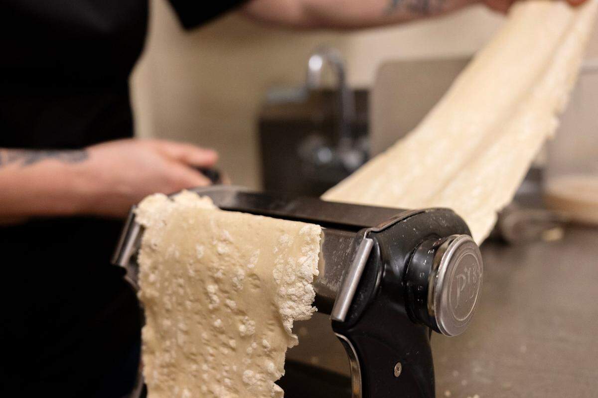 Sabrina Ippolito perpares cannoli dough at Ippolito’s Trattoria in Rosemont earlier this month.