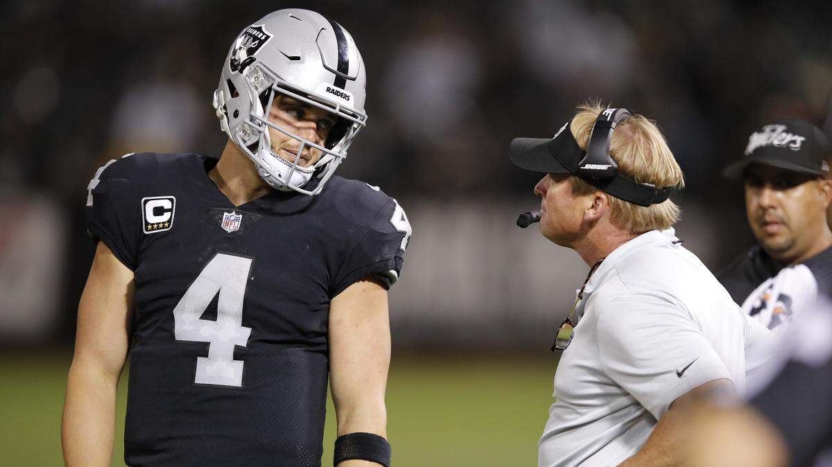 Oakland Raiders quarterback Derek Carr, left, and coach Jon Gruden on the sidelines during a game this season. The Raiders are 1-5 and with a struggling defense have the third-largest point differential in the NFL.