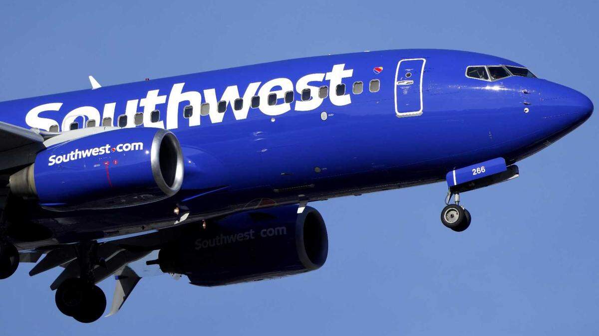 A Boeing 737 flown by Southwest Airlines lands in December at St. Louis Lambert International Airport. A Southwest flight on its way to Denver returned to Sacramento International Airport Tuesday Oct. 1, 2024, after a reported malfunction on a Boeing 737.
