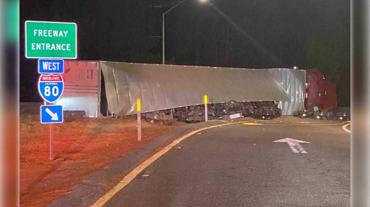 An overturned semi-truck blocked part of Interstate 80 and the on-ramp at West Paoli Lane following a crash on Tuesday, Sept. 23, 2025.