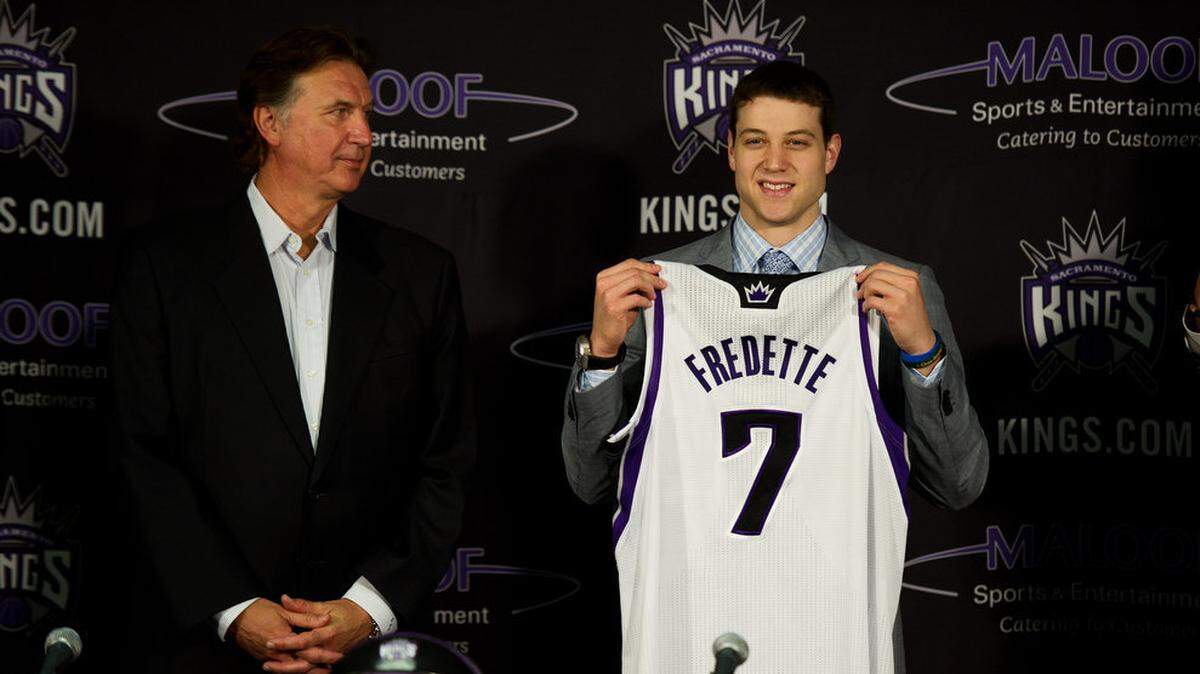 Kings draft pick Jimmer Fredette, and Kings president of basketball operations Geoff Petrie at the news conference at Power Balance Pavilion in Sacramento. June 25, 2011