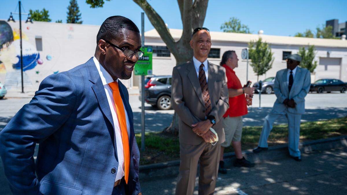 Richard Louis Brown stands in the parking lot with his supporters at SEIU Local 1000 before he is sworn as president on June 27, 2021.