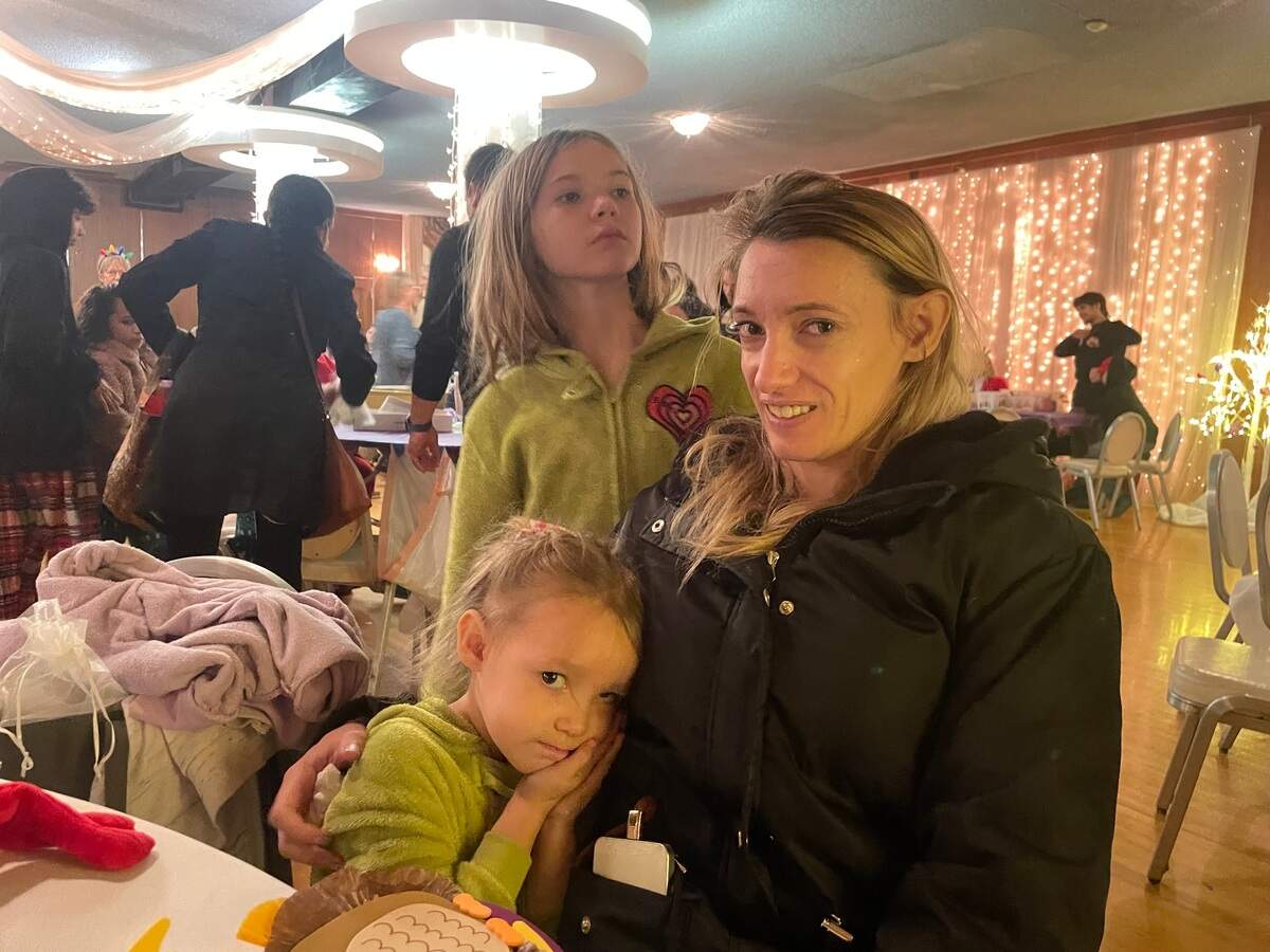 Karen Sondheim with daughters Cheyenne and Natasha at Women’s Empowerment annual crafty holiday party at Capitol Plaza Ballrooms in downtown Sacramento on Saturday.