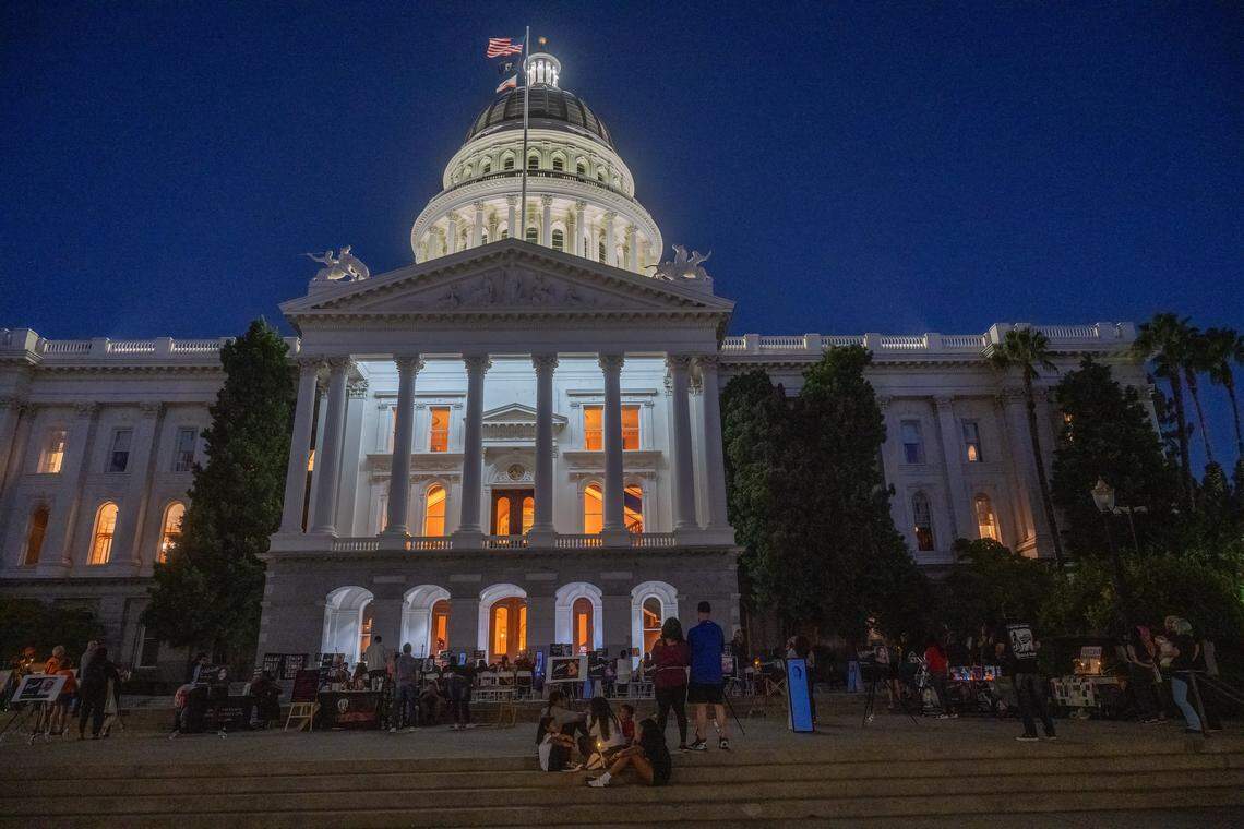 Family and friends of homicide victims light candles in tribute on a National Day of Remembrance for homicide victims on Sept. 25 in Sacramento. Erika Pringle, whose brother died from vehicular homicide, spoke at the event and plans to host a gathering for victims of vehicular homicide at the state Capitol on Sunday.