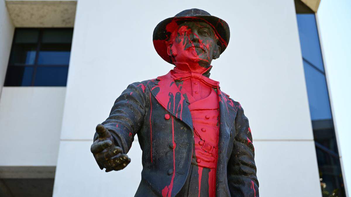 A statue of John Sutter, a European pioneer who settled in Sacramento, was vandalized with red paint outside Sutter Health Medical Center in midtown Sacramento on Tuesday, June 9, 2020.