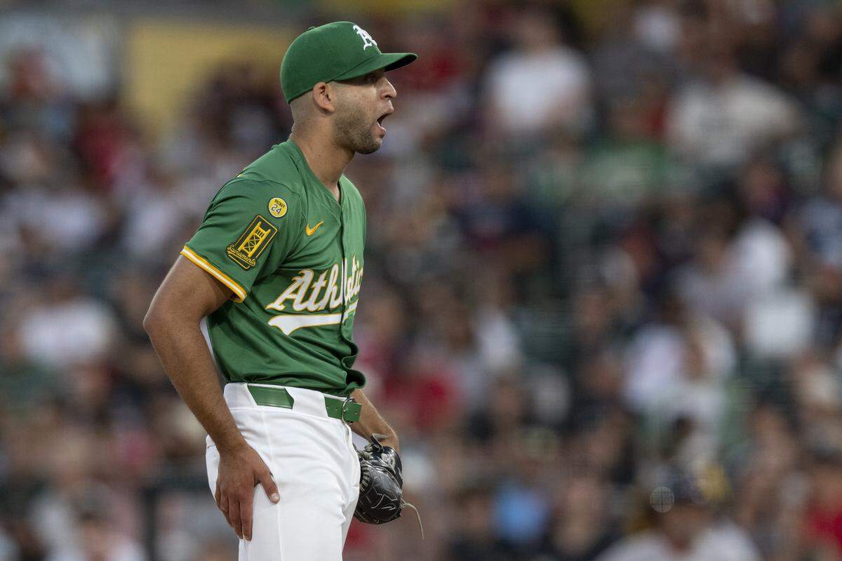Athletics pitcher Luis Morales (58) reacts to a pitch during a game between the Athletics and the Red Sox at Sutter Health Park in West Sacramento on Monday.