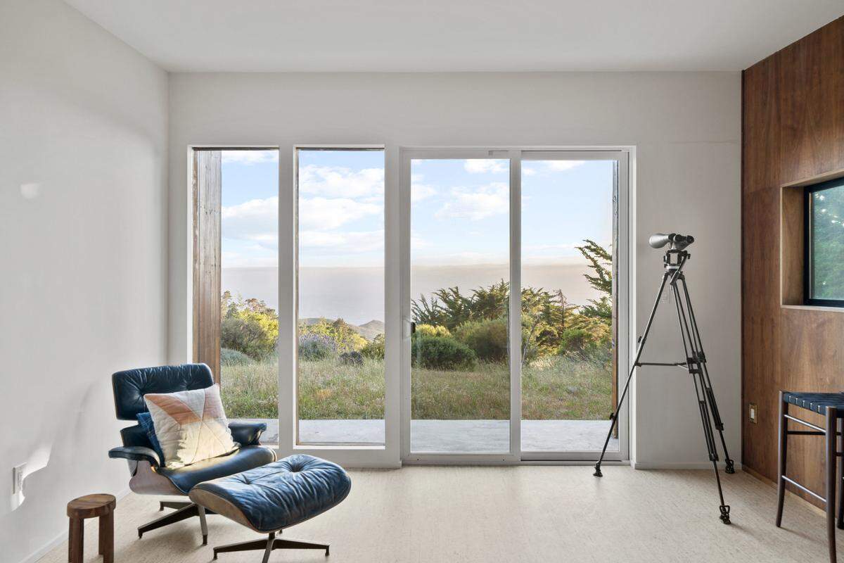 A modern California coastal residence with panoramic views of the Big Sur coastline on five untouched acres has hit the market for $1.85 million.