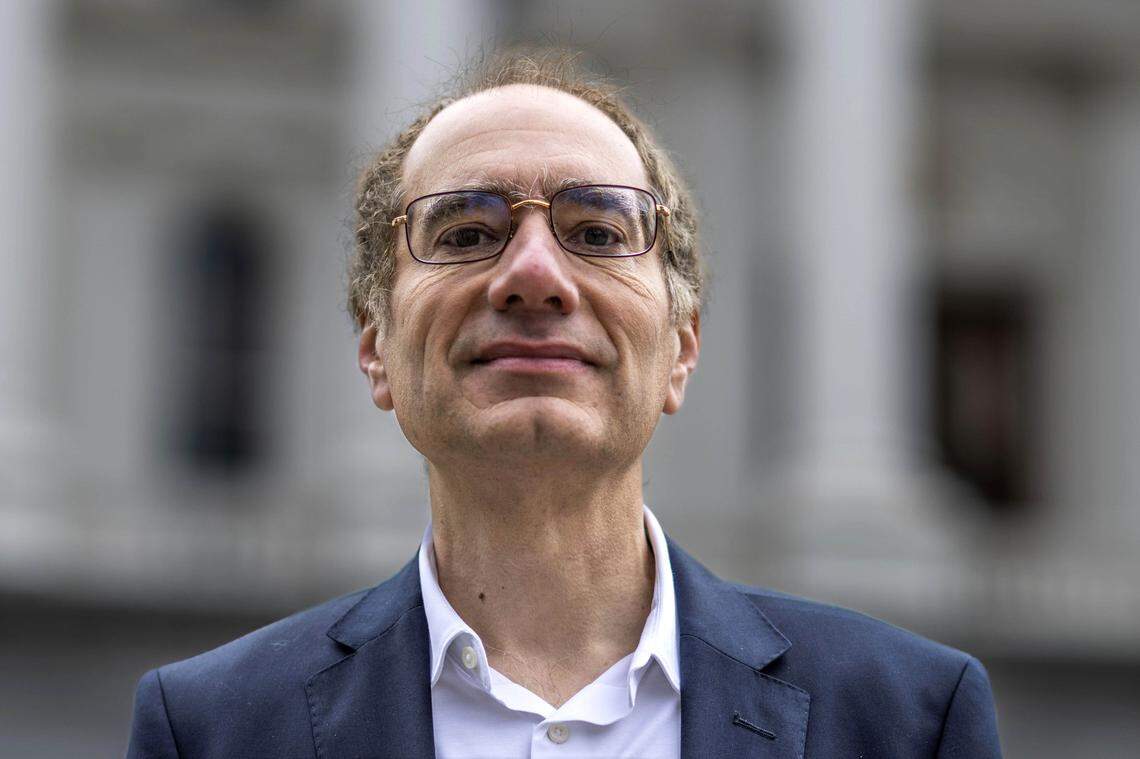 Patrick Wolff, a candidate for California Insurance Commissioner, stands in front of the state Capitol on Tuesday.