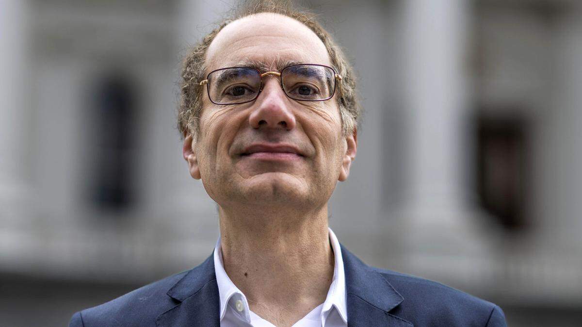 Patrick Wolff, a candidate for California Insurance Commissioner, stands in front of the State Capitol on Tuesday, Jan. 20, 2026.