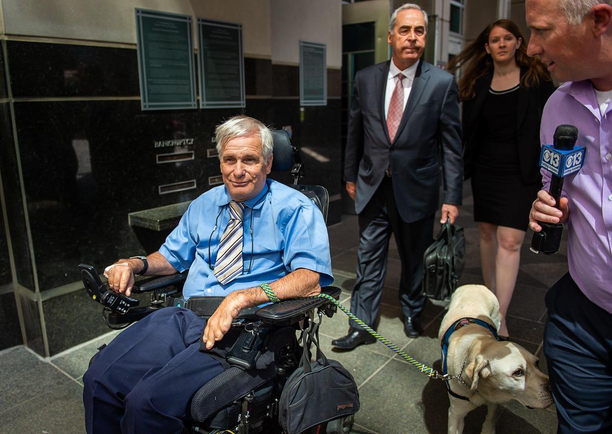 Serial ADA lawsuit filer Scott Johnson leaves his 2019 appearance after being indicted on tax charges in Sacramento. On Tuesday, Johnson was sentenced to 18 months home confinement, $250,000 in restitution and $50,000 in fines for his guilty plea.