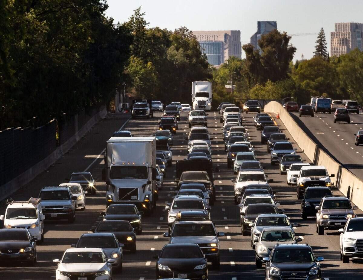 A steady stream of vehicles move southbound on Highway 99 through south Sacramento and away from the city core during evening commute hours on Thursday, July 8, 2021.