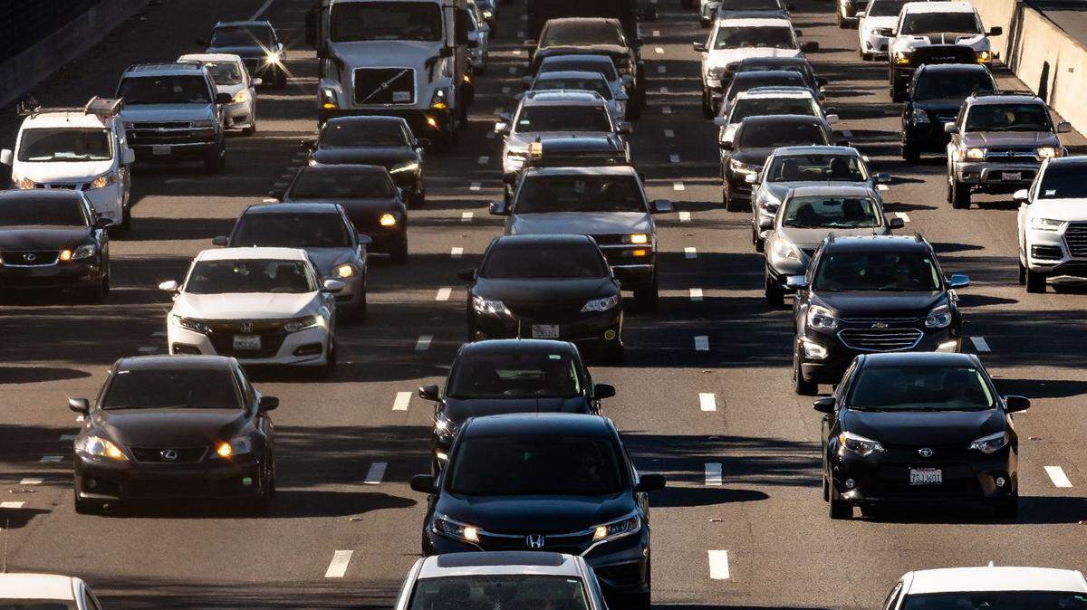A steady stream of vehicles move southbound on Highway 99 through south Sacramento and away from the city core during evening commute hours. New infrastructure legislation aims to make the roads safer.