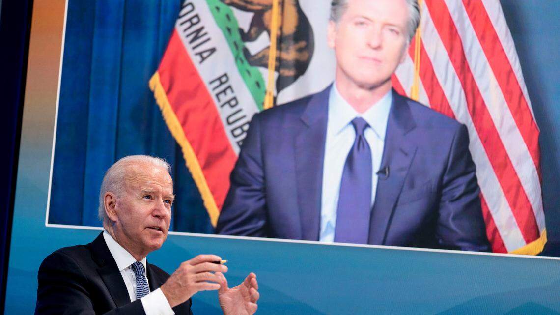 President Joe Biden speaks with California Gov. Gavin Newsom via teleconference during a meeting with governors to discuss ongoing efforts to strengthen wildfire prevention, preparedness and response efforts, and hear firsthand about the ongoing impacts of the 2021 wildfire season in the South Court Auditorium in the Eisenhower Executive Office Building on the White House Campus in Washington, Friday, July 30, 2021. (AP Photo/Andrew Harnik)