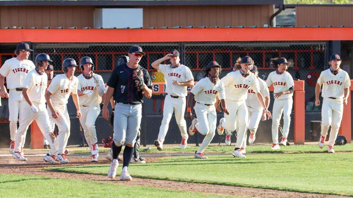The Roseville High School baseball teams celebrates after a 5-4 walk-off victory over No. 3 Woodcreek.