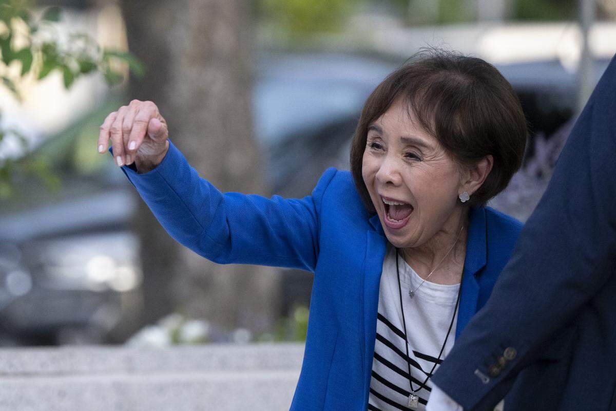 U.S. Rep. Doris Matsui waves to her supporters as she leaves Sellands on Broadway in Sacramento on primary election night on Tuesday.