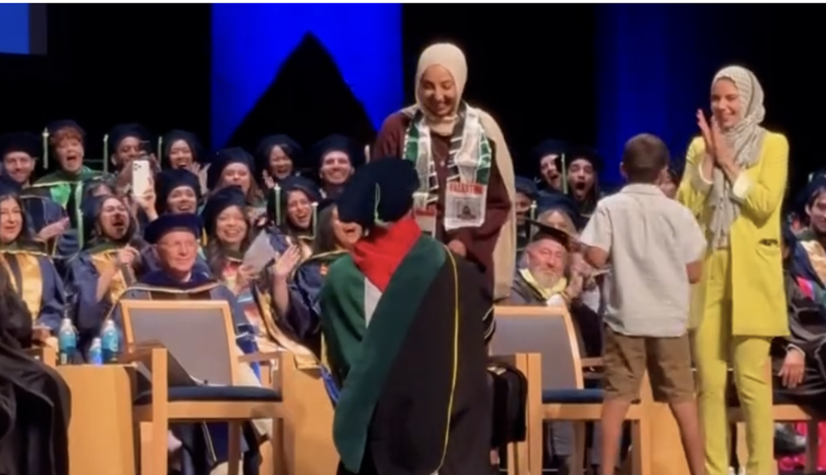 Habib Salamah gets down on one knee to propose to Alaa’i Alshabrawy as he receives his diploma during the UC Davis School of Medicine commencement ceremony on Saturday, May 16, 2026, at the Mondavi Center in Davis. The proposal, shared on the university’s social media pages, drew widespread attention online as Salamah and Alshabrawy celebrated their graduation and engagement.