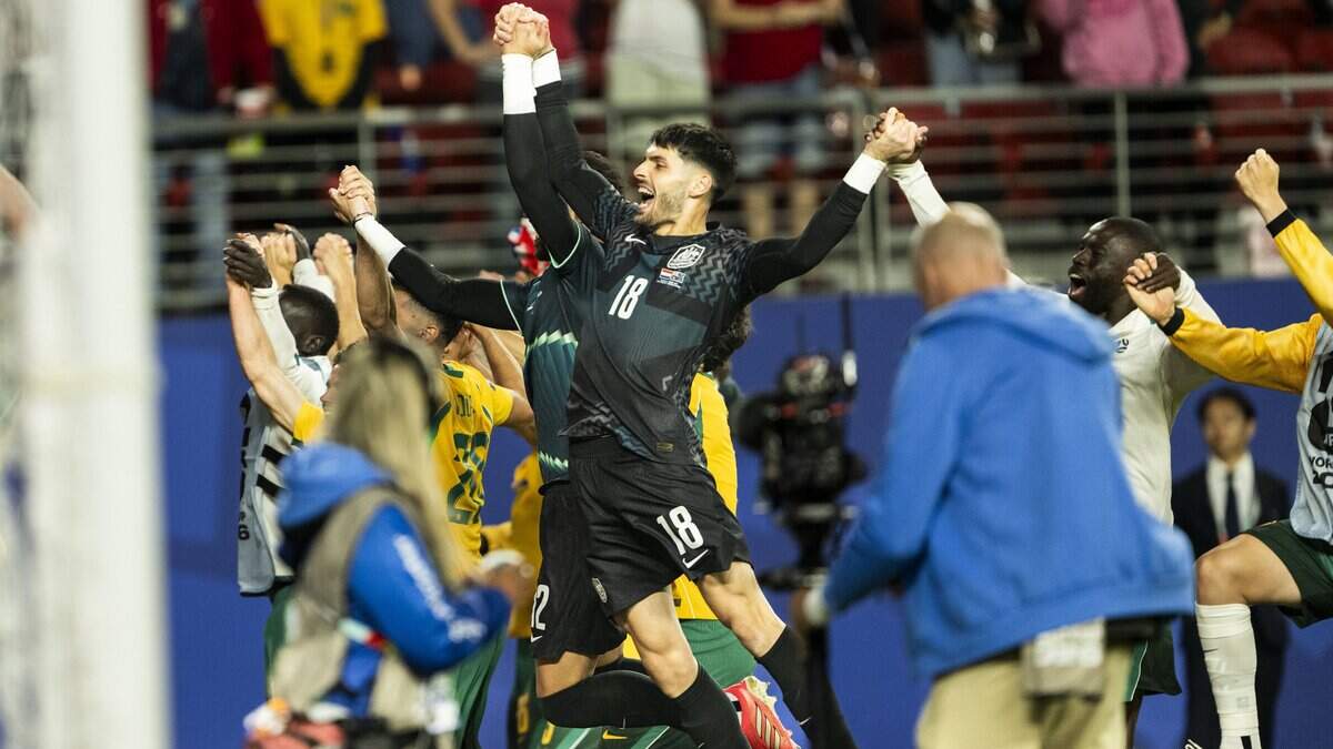 Australia goalkeeper Patrick Beach celebrates his team’s 0-0 tie with teammates during the match against Paraguay in the group stage of the 2026 World Cup at Levi’s Stadium on Thursday in Santa Clara.