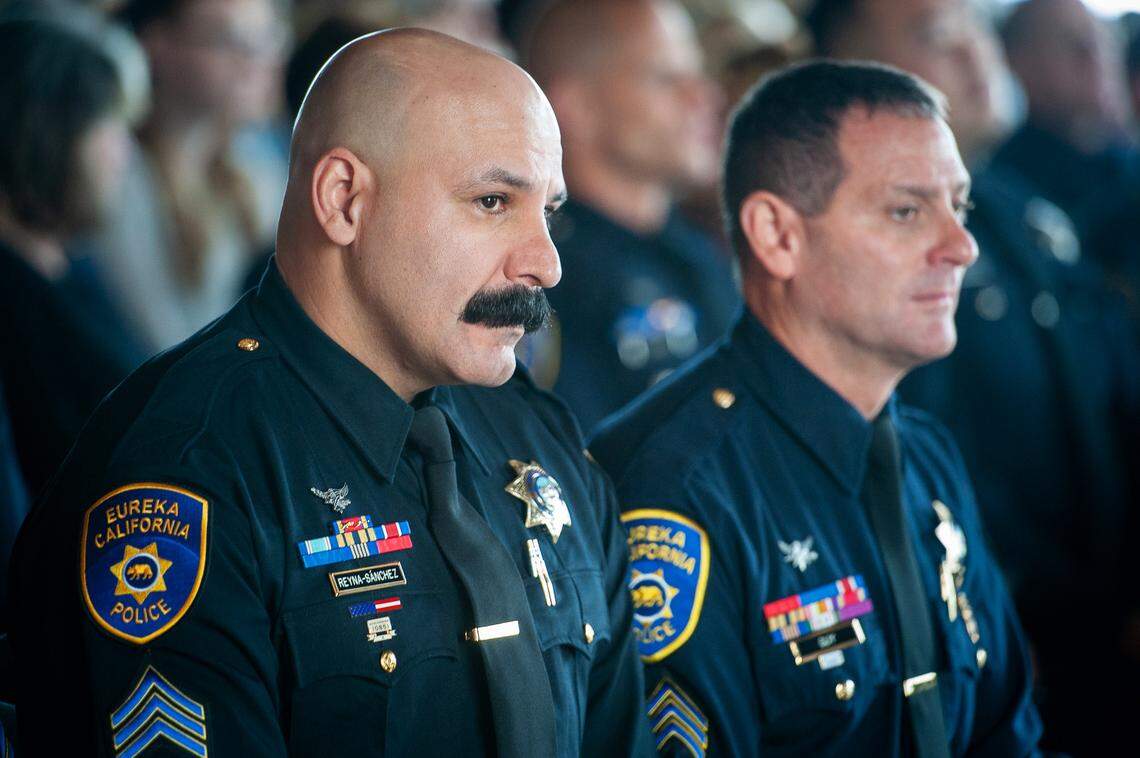 Sgt. Rodrigo Reyna-Sanchez, left, attends a Eureka Police Department promotion ceremony at the Wharfinger Building in Eureka in November 2014.