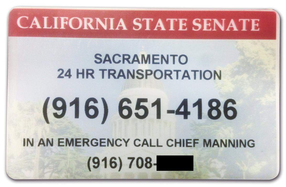 A plastic card issued to members of the California Senate in 2015 offers 24-hour transportation and includes the phone number of Debbie Manning, the Senate’s Chief Sergeant-at-Arms at the time, telling members to call her an emergency. Manning’s number was obscured by The Bee.