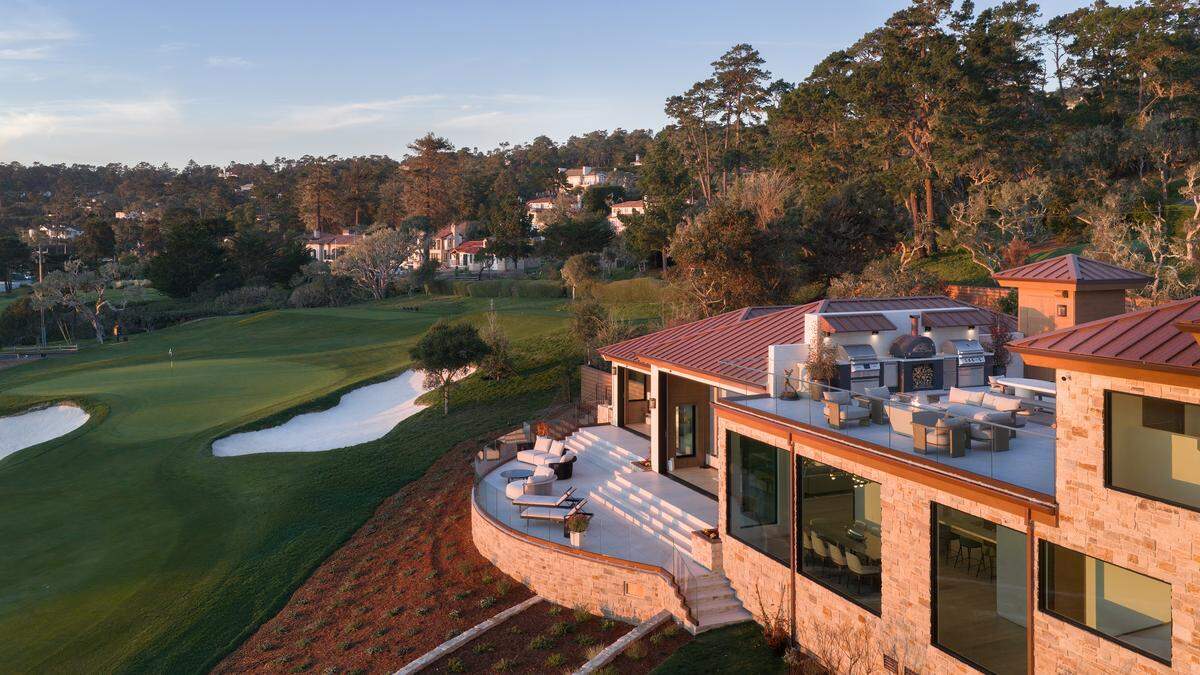 The rooftop pavilion features a full outdoor kitchen, dining space, and sunset lounge.