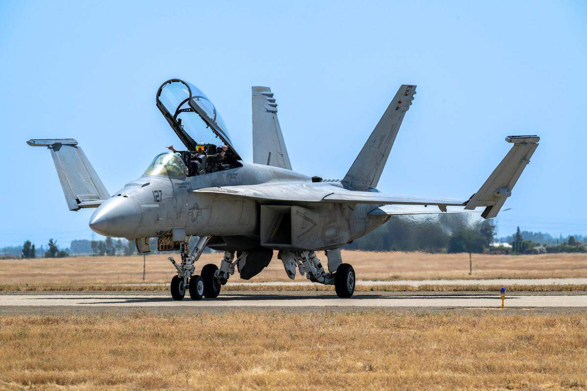 The U.S. Navy F-18 Rhino Demo Team waves to the crowd after performing at the Air & Space Expo at Beale Air Force Base on Saturday, June 7, 2025.