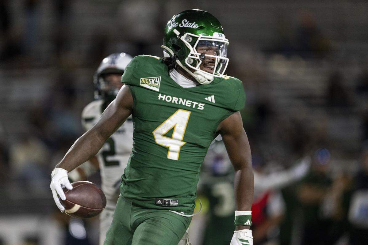 Sacramento State Hornets running back Damian Henderson II (4) runs into the end zone in the fourth quarter of a NCAA football game against the Mercyhurst Lakers on Saturday at Hornet Stadium in Sacramento.