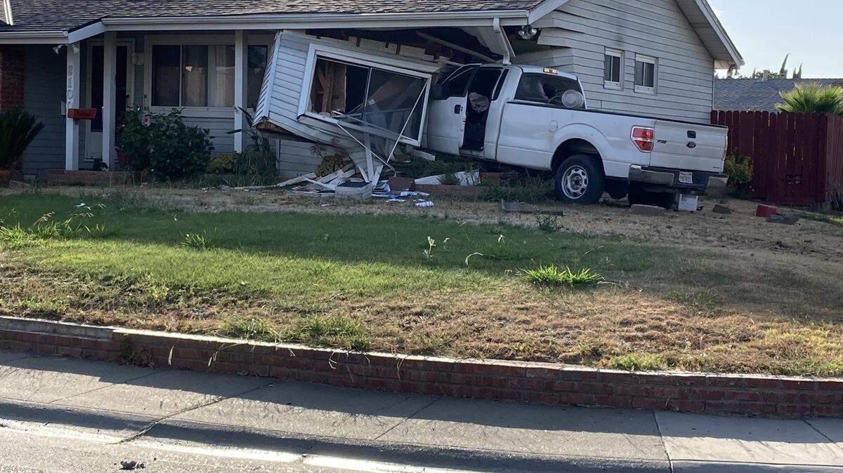 A truck crashed into the side of a south Sacramento home Thursday. The driver was fleeing from police.