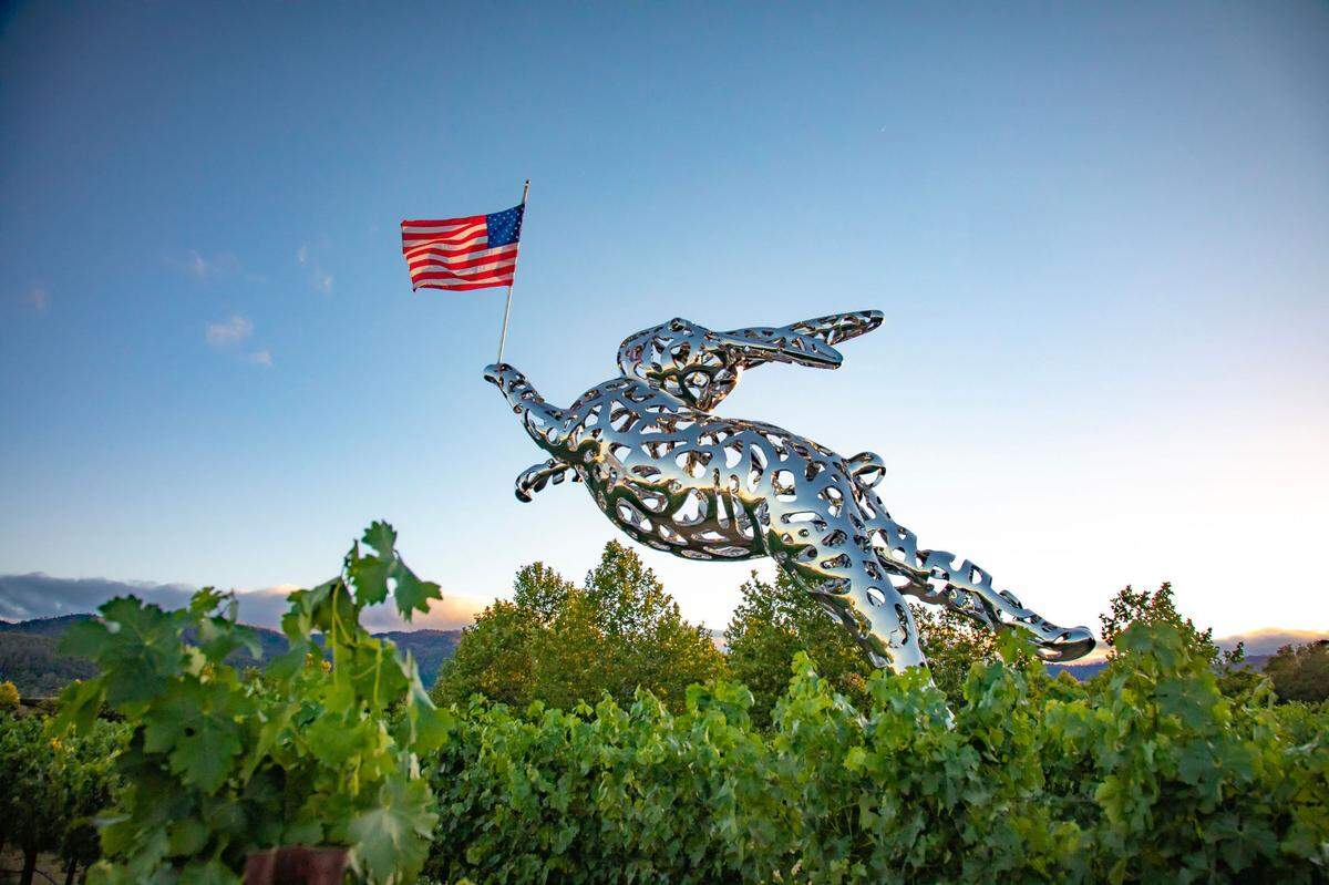 “Bunny Foo Foo” holds an American flag in celebration of Independence Day at Hall Wines in St. Helena.