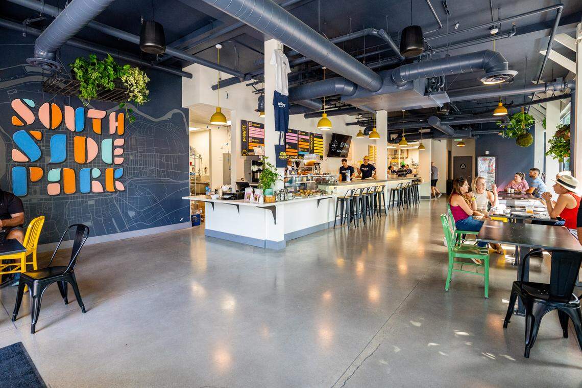 Customers try Doughbot’s offerings, which include donuts, cookies and scones, on Thursday, July 28, 2022, in Sacramento’s Southside Park neighborhood.