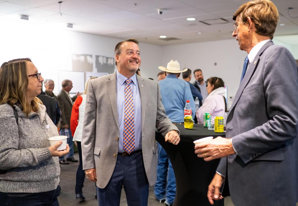 Sacramento County Board of Supervisors District 5 candidate Pat Hume, center, talks with retiring Supervisor Don Nottoli at the Hume campaign office in Elk Grove on Election Day late Tuesday, Nov. 8, 2022, while watching the results of the race. Jaclyn Moreno ran against Hume for the District 5 seat.