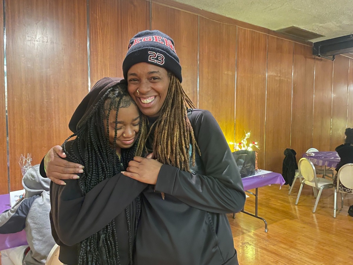 Rochelle Goodwin poses with daughter Nichelle at Women’s Empowerment annual holiday craft party on Saturday at Capitol Plaza Ballrooms in downtown Sacramento.