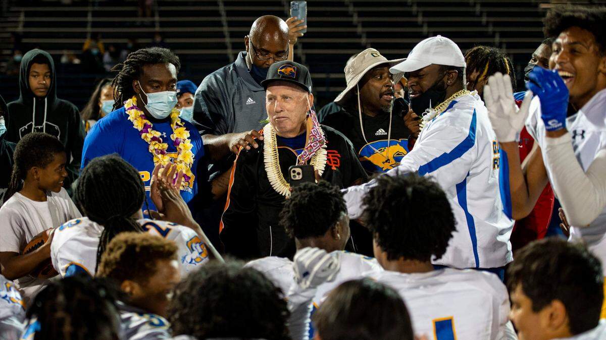 Grant High School head coach Mike Alberghini prepares to speak with his team after winning their final game of the season, Friday, April 16, 2021, as the Pacers went up against Capital Christian at Capital Christian High School in Rancho Cordova.