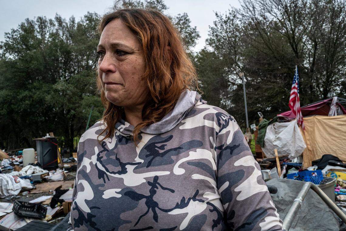 Tears stream down her face of Susan Hunter on Monday as she recalls Steven “Skip” Sorensen, 61, who died Sunday in Sacramento when a tree fell on him.