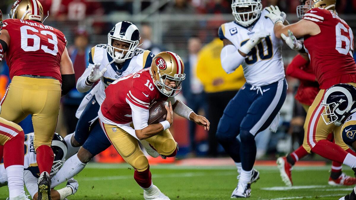 San Francisco 49ers quarterback Jimmy Garoppolo (10) is tackled by Los Angeles Rams linebacker Dante Fowler (56) in the first quarter during a game at Levi’s Stadium on Saturday, December 21, 2019 in Santa Clara, Calif.