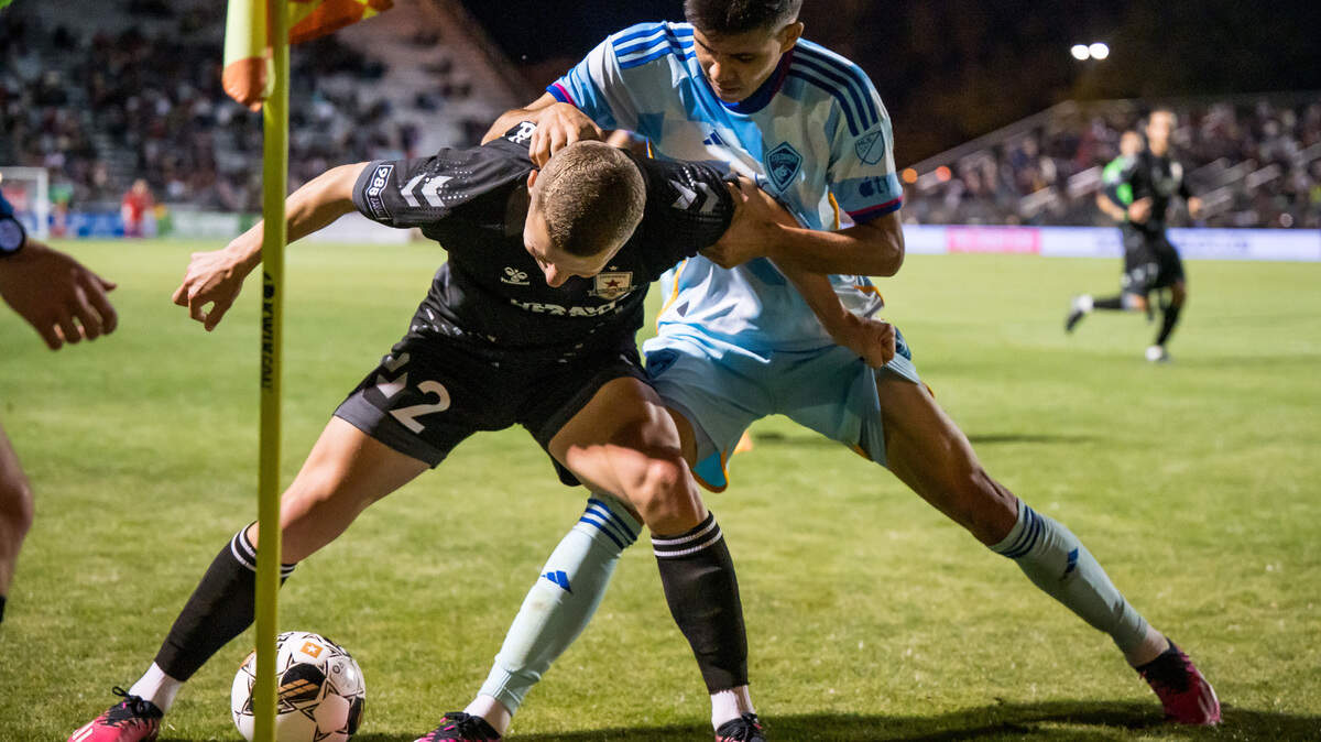 Sacramento Republic FC defender Jack Gurr (2), left, and Colorado Rapids defender Anthony Markanich (31) fight for the ball in the corner during the second half of the U.S. Open Cup Round of 32 soccer match Tuesday, May 9, 2023, at Heart Health Park in Sacramento.