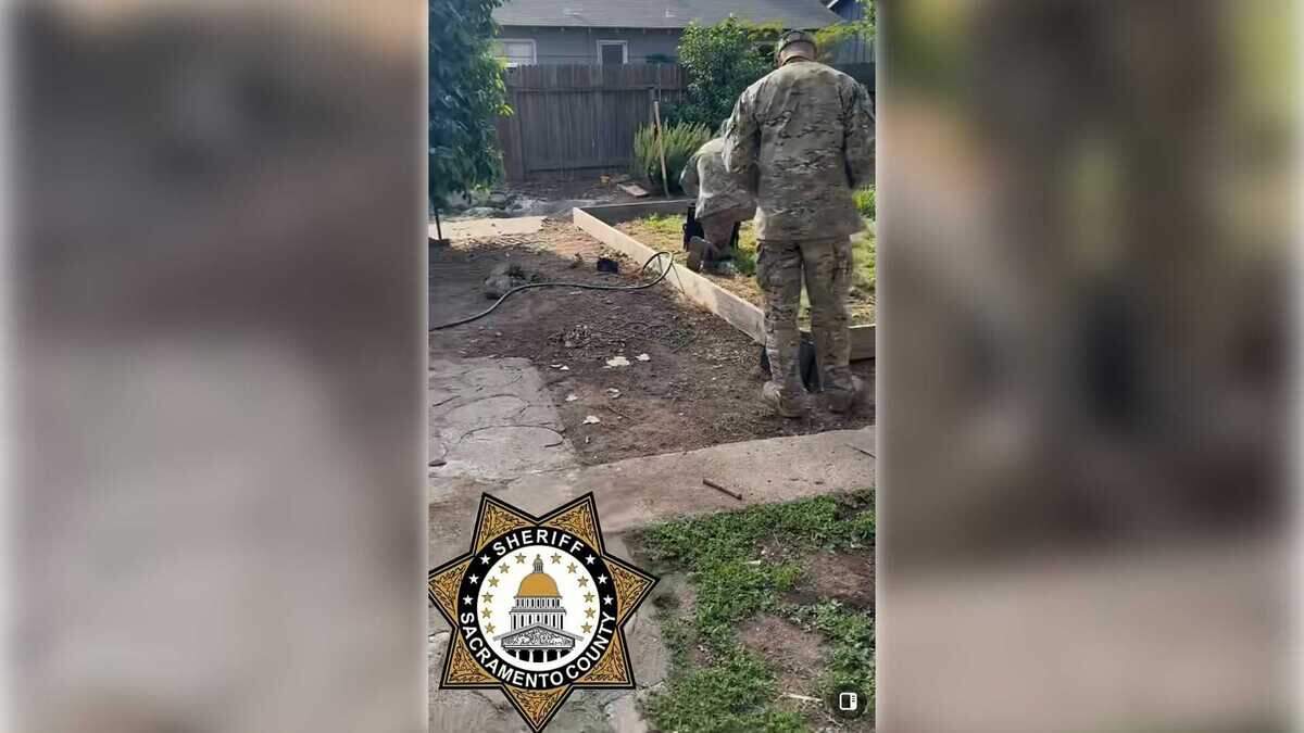 Authorities remove a mortar shell Sunday after it was discovered by a boy in the backyard of his Carmichael home.