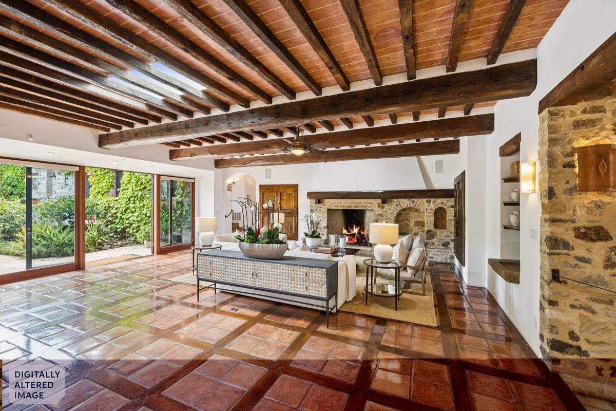 The 7,155-square-foot stone villa features four bedroom suites and an executive office, separate two-bedroom family cottage and a one-bedroom guest house.