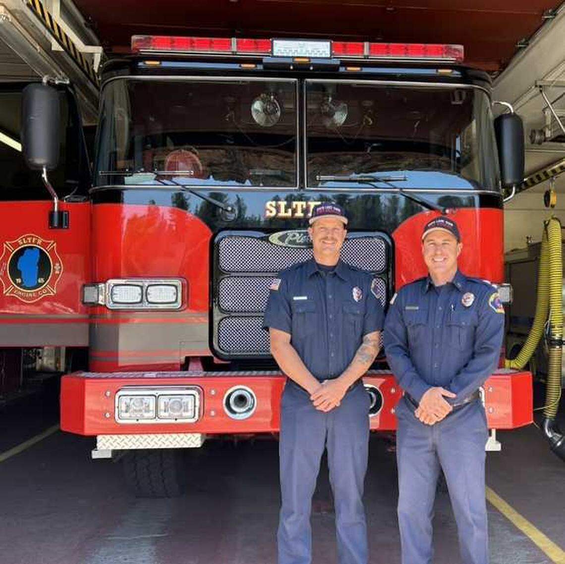 Firefighter-paramedic Stuart Bogle, left, and Capt. Trent Renner stand inside South Lake Tahoe Fire Rescue Station No. 3 on June 27. The pair, along with an engineer, helped rescue boaters during the June 21 storm.