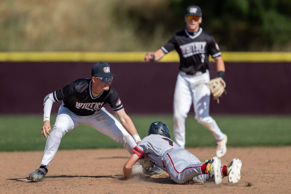 Whitney shortstop Luke Oyler applies the tag to pick off Cordova’s Levi Nyberg at second base as the top-seeded Wildcats rolled to a 11-0 win in a first-round CIF Sac-Joaquin Section Division ll baseball playoff game on Tuesday at Whitney High School in Rocklin.