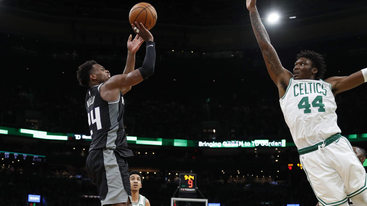 Sacramento’s Buddy Hield hoists a shot over Boston’s Robert Williams III during the fourth quarter Monday.