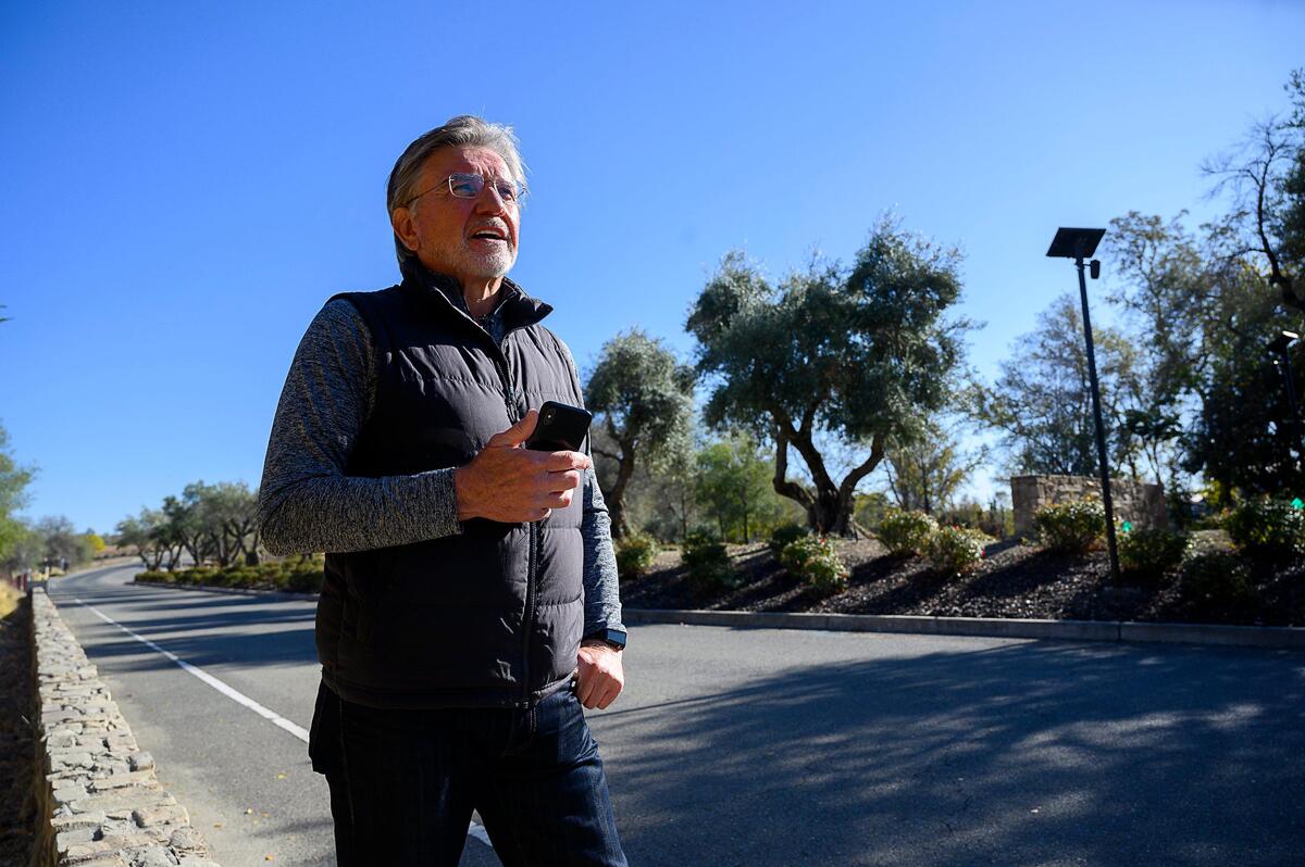 Hans Geyer, president of the homeowners association talks about the camera that captures the license plate of vehicles entering the Loomis community Sierra de Montserrat on Monday, November 25, 2019 in Rocklin. After two property crimes occurred, the Loomis community Sierra de Montserrat gladly handed police footage of the alleged perpetrators.