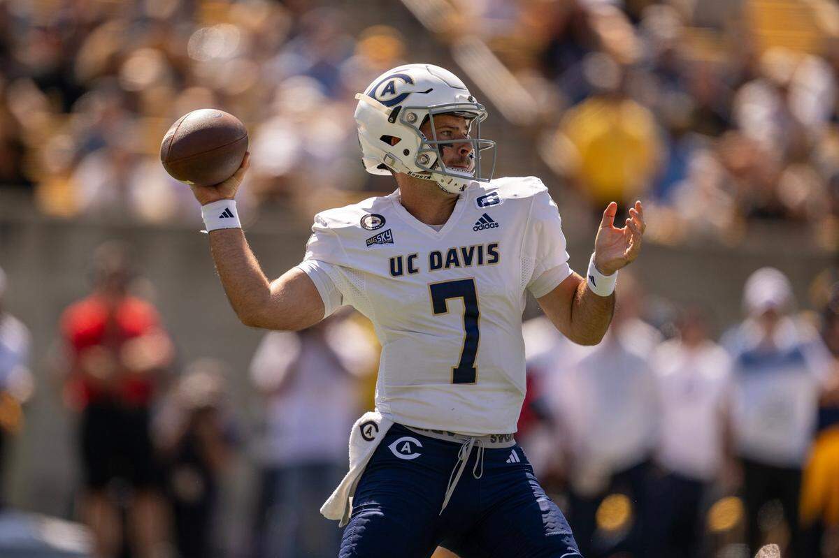 UC Davis Aggies quarterback Miles Hastings (7) delvers a pass Aug. 31, 2024, in a game against the California Golden Bears at Memorial Stadium in Berkeley.